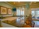 Community kitchen with granite counters, ocean views, and seating for residents at 11 San Marco St # 903, Clearwater, FL 33767