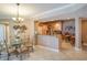 Kitchen with breakfast bar and dining area at 11 San Marco St # 903, Clearwater, FL 33767