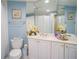 Clean bathroom with white vanity and updated fixtures at 11 San Marco St # 903, Clearwater, FL 33767