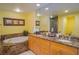 Bright bathroom featuring double sinks and marble countertops at 11 San Marco St # 903, Clearwater, FL 33767