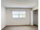 Spacious bedroom with window and built-in closet at 11485 Oakhurst Rd # 107, Largo, FL 33774