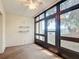 Enclosed patio with view of a lake at 11485 Oakhurst Rd # 107, Largo, FL 33774