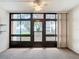 Enclosed patio with view of a lake at 11485 Oakhurst Rd # 107, Largo, FL 33774