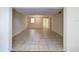 View of dining room with chandelier and tile floors at 11485 Oakhurst Rd # 107, Largo, FL 33774