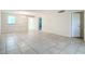 View of dining area with tile floors and chandelier at 11485 Oakhurst Rd # 107, Largo, FL 33774
