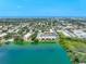 Aerial picture of waterfront condo community with lush green surroundings at 11485 Oakhurst Rd # 107, Largo, FL 33774