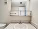 Bathroom vanity with sink and mirrored medicine cabinet at 11485 Oakhurst Rd # 107, Largo, FL 33774