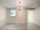 Dining room features a view into the kitchen at 11485 Oakhurst Rd # 107, Largo, FL 33774
