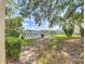 Waterfront view with gazebo and dock at 11485 Oakhurst Rd # 107, Largo, FL 33774
