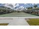 Outdoor shuffleboard courts with covered seating offer a social and recreational amenity for residents at 5347 81St N Ln # 22, St Petersburg, FL 33709