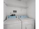 Laundry room with side-by-side washer and dryer at 10590 Windsor Lake Ct # 0, Tampa, FL 33626