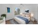 Bright bedroom with a queen-size bed and large window at 10590 Windsor Lake Ct # 0, Tampa, FL 33626