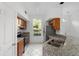Modern kitchen with granite countertops and stainless steel appliances at 10590 Windsor Lake Ct # 0, Tampa, FL 33626