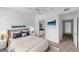 Main bedroom with ensuite bathroom and a queen bed at 10590 Windsor Lake Ct # 0, Tampa, FL 33626
