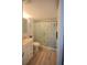 Updated bathroom with a shower/tub combo at 948 Virginia St # 205, Dunedin, FL 34698
