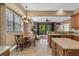 Eat-in kitchen with breakfast nook and view to the living area at 6226 Anhinga Pl, Tampa, FL 33615