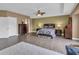 Spacious main bedroom with walk-in closet and ensuite bathroom at 6226 Anhinga Pl, Tampa, FL 33615