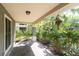 Covered patio with lush landscaping at 6226 Anhinga Pl, Tampa, FL 33615