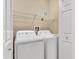 Convenient laundry room with washer and dryer in a closet at 6226 Anhinga Pl, Tampa, FL 33615