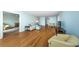 Spacious living area with hardwood floors and open layout at 5130 Brittany S Dr # 202, St Petersburg, FL 33715
