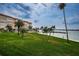 Community boasts a waterfront location with lush landscaping and palm trees at 5130 Brittany S Dr # 202, St Petersburg, FL 33715