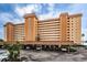 A multi-story building with ample parking underneath at 5130 Brittany S Dr # 202, St Petersburg, FL 33715