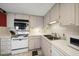 Updated kitchen with ample cabinet space at 675 S Gulfview Blvd # 903, Clearwater Beach, FL 33767