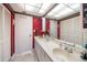 Double vanity bathroom with updated fixtures at 675 S Gulfview Blvd # 903, Clearwater Beach, FL 33767