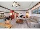 Spacious living room with comfortable seating and water views at 675 S Gulfview Blvd # 903, Clearwater Beach, FL 33767