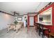 Dining area with kitchen access and seating for four at 675 S Gulfview Blvd # 903, Clearwater Beach, FL 33767