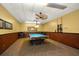 Relaxing game room with a pool table and seating area at 675 S Gulfview Blvd # 903, Clearwater Beach, FL 33767
