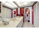 Double vanity bathroom with updated fixtures at 675 S Gulfview Blvd # 903, Clearwater Beach, FL 33767