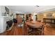 Spacious living room with hardwood floors and a cozy fireplace at 327 Lotus Path, Clearwater, FL 33756