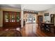 Bright dining room with hardwood floors and access to the backyard at 327 Lotus Path, Clearwater, FL 33756