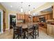 Open concept kitchen with island and stainless steel appliances at 327 Lotus Path, Clearwater, FL 33756