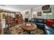 Comfortable living room featuring hardwood floors and a fireplace at 327 Lotus Path, Clearwater, FL 33756