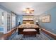 Spacious main bedroom with a king-size bed and light blue walls at 327 Lotus Path, Clearwater, FL 33756