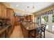 Open kitchen with large island, granite counters and breakfast bar at 327 Lotus Path, Clearwater, FL 33756