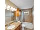 Bathroom with shower/tub combo and granite vanity at 6420 Banyan Blvd # 303, New Port Richey, FL 34652