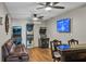 Fun game room featuring arcade games, a dartboard, and a wet bar at 6420 Banyan Blvd # 303, New Port Richey, FL 34652