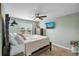 Main bedroom with large window and water view at 6420 Banyan Blvd # 303, New Port Richey, FL 34652