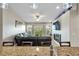 Modern kitchen with granite countertops and view into living room at 6420 Banyan Blvd # 303, New Port Richey, FL 34652