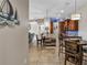 Open concept kitchen with island and breakfast nook at 6420 Banyan Blvd # 303, New Port Richey, FL 34652