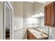 Clean bathroom with granite countertop and updated vanity at 6420 Banyan Blvd # 303, New Port Richey, FL 34652
