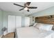 Bedroom with a king-size bed and built in closet at 6420 Banyan Blvd # 303, New Port Richey, FL 34652
