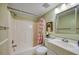 Clean bathroom with shower/tub combo and white vanity at 900 Cove Cay Dr # 1H, Clearwater, FL 33760