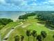 Aerial view of golf course community with water access at 900 Cove Cay Dr # 1H, Clearwater, FL 33760