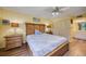 Comfortable main bedroom with king-size bed and ensuite bathroom access at 900 Cove Cay Dr # 1H, Clearwater, FL 33760