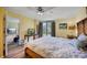 Spacious bedroom with king-size bed and access to another room and patio at 900 Cove Cay Dr # 1H, Clearwater, FL 33760