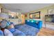 Comfortable living room with hardwood floors and view to patio at 900 Cove Cay Dr # 1H, Clearwater, FL 33760